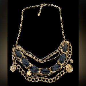 Bebe gold tone layered charm necklace